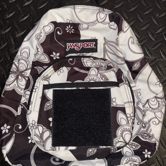 Jansport Handbags - Jansport Monochrome Floral Mini Backpack